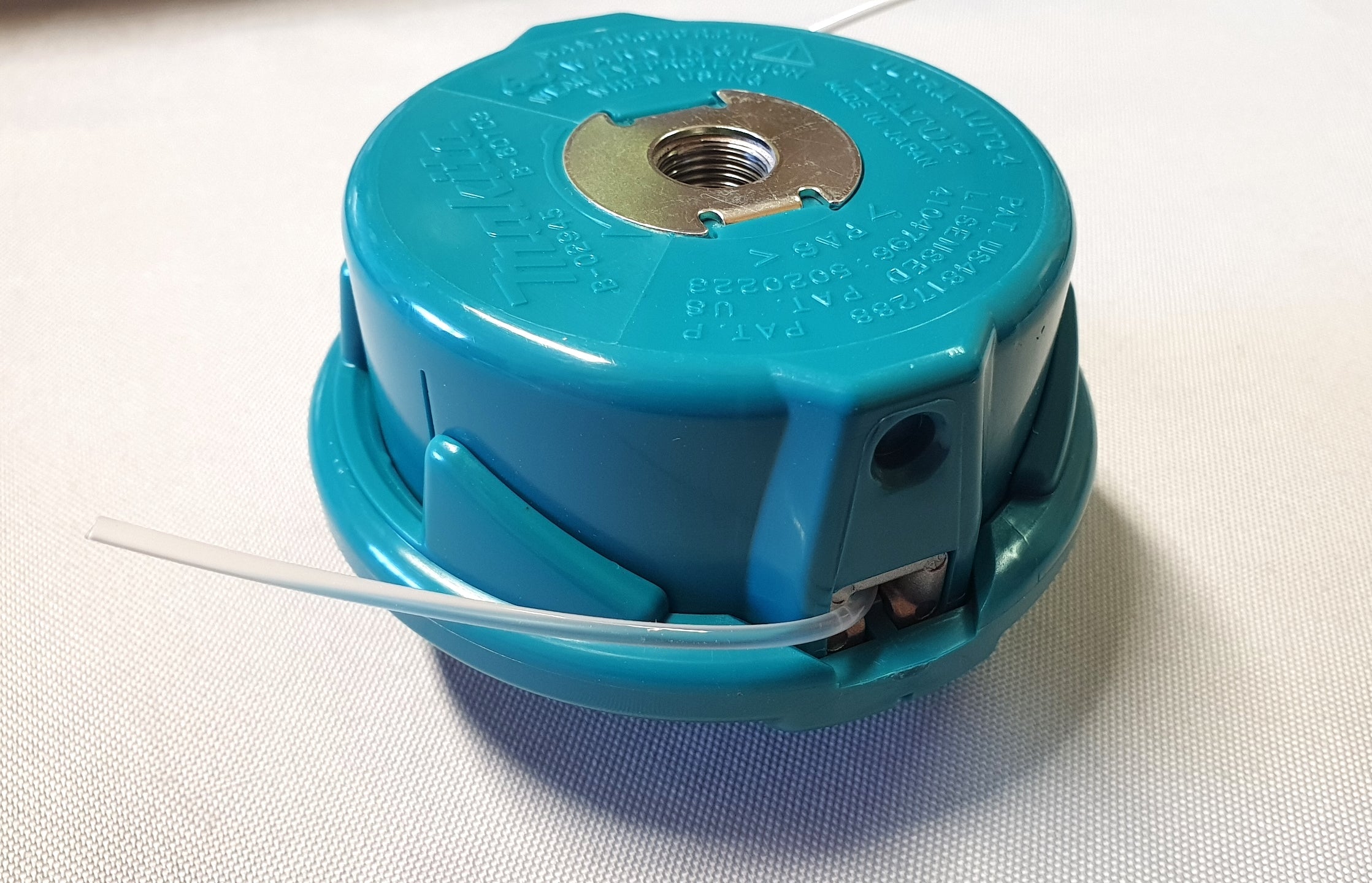 New Genuine Makita B-02945 Nylon Cutting Head Auto, M8&M10X1,25LH, 2,4MM